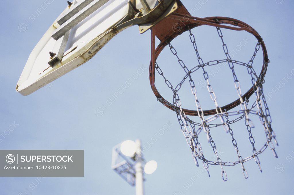 Stock Photo: 1042R-10375 Low angle view of a basketball hoop