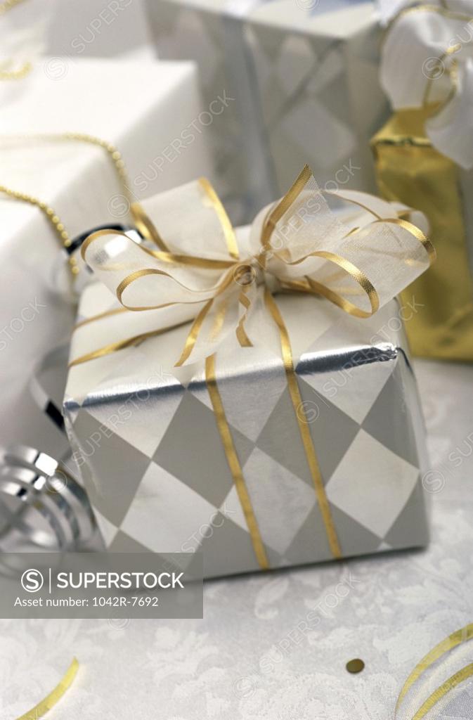 Stock Photo: 1042R-7692 Wrapped gift with a bow