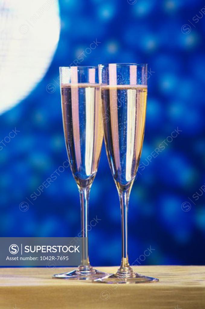 Stock Photo: 1042R-7695 Close-up of two champagne flutes on a table