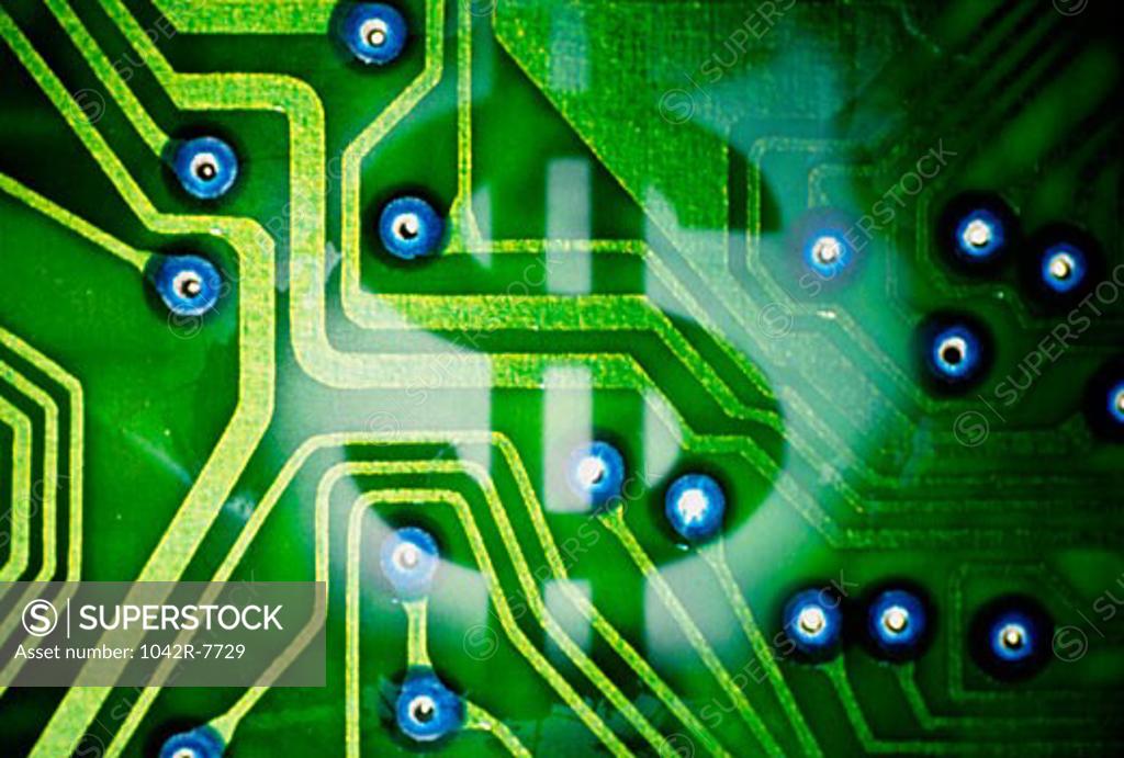 Stock Photo: 1042R-7729 Dollar sign superimposed over a circuit board