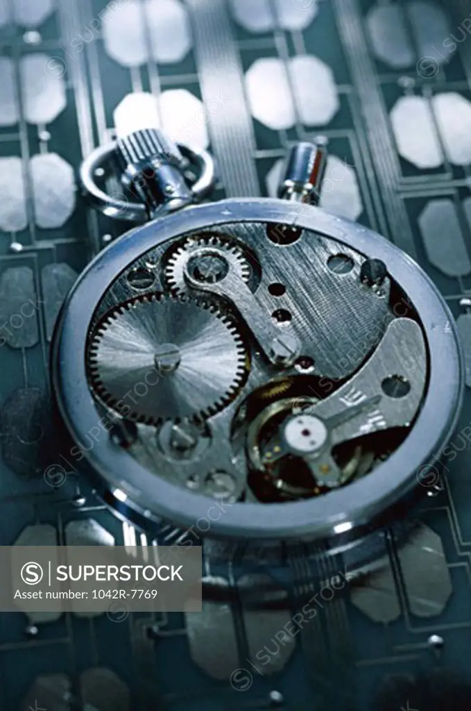 Close-up of gears in a watch