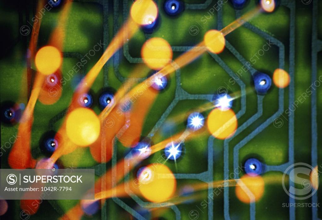 Stock Photo: 1042R-7794 Fiber optics with a circuit board in the background
