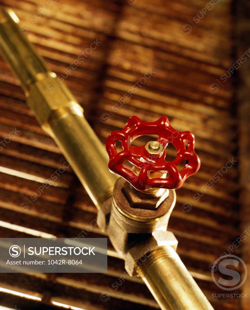 Stock Photo: 1042R-8064 Close-up of a pipe and a valve