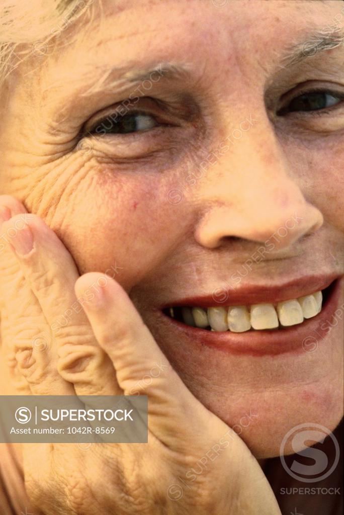 Stock Photo: 1042R-8569 Portrait of a senior woman smiling
