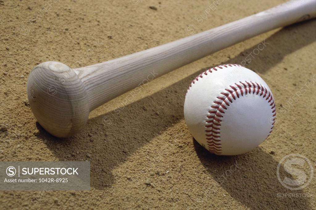 Stock Photo: 1042R-8925 Close-up of a baseball bat and a baseball