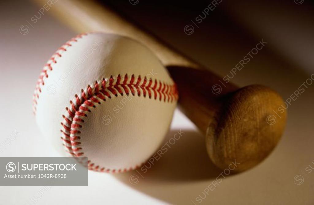 Stock Photo: 1042R-8938 Close-up of a baseball bat and a baseball