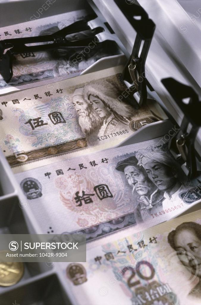 Stock Photo: 1042R-9304 Yuan banknotes in a cash register