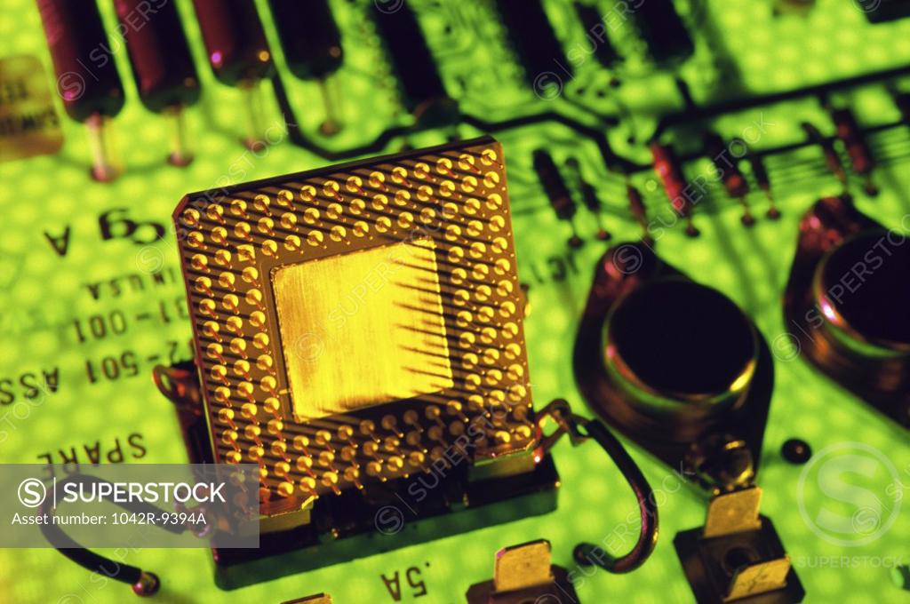 Stock Photo: 1042R-9394A Close-up of a computer chip on a circuit board