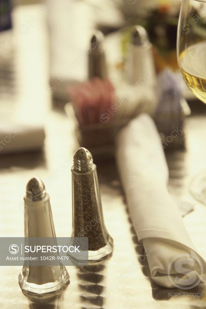 Stock Photo: 1042R-9479 Close-up of salt and pepper shakers on a table
