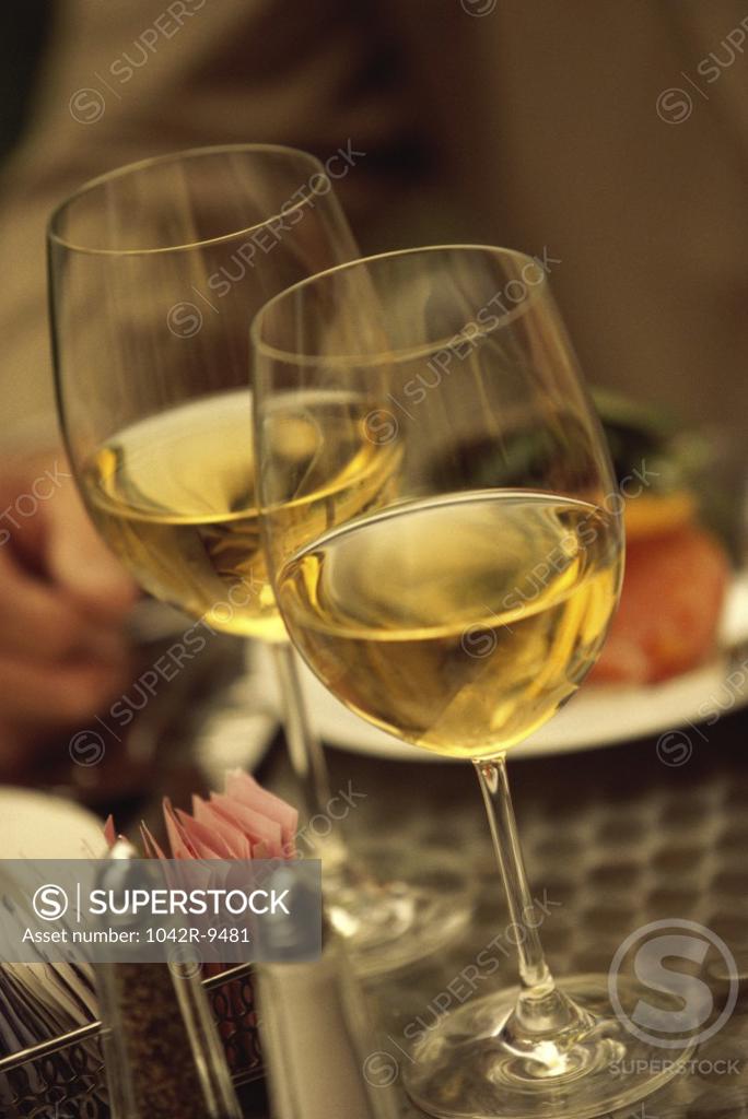 Stock Photo: 1042R-9481 Two wineglasses on a table