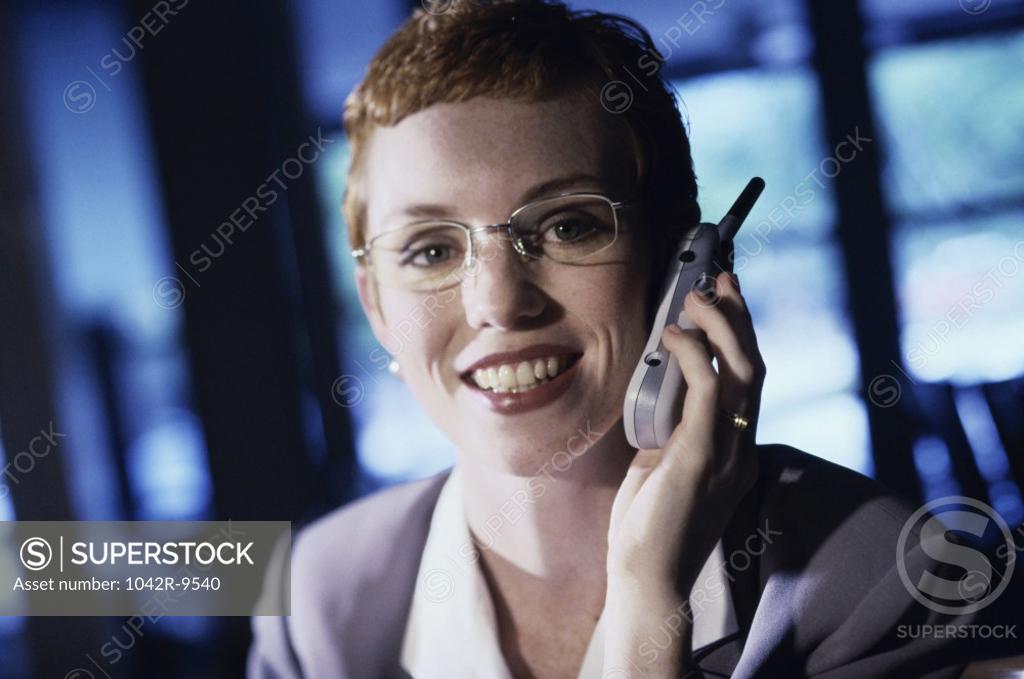 Stock Photo: 1042R-9540 Portrait of a businesswoman talking on a mobile phone