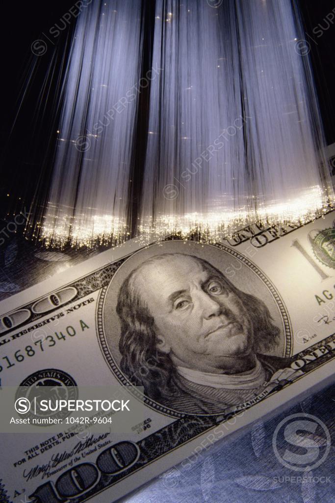 Stock Photo: 1042R-9604 American dollar bill with fiber optics