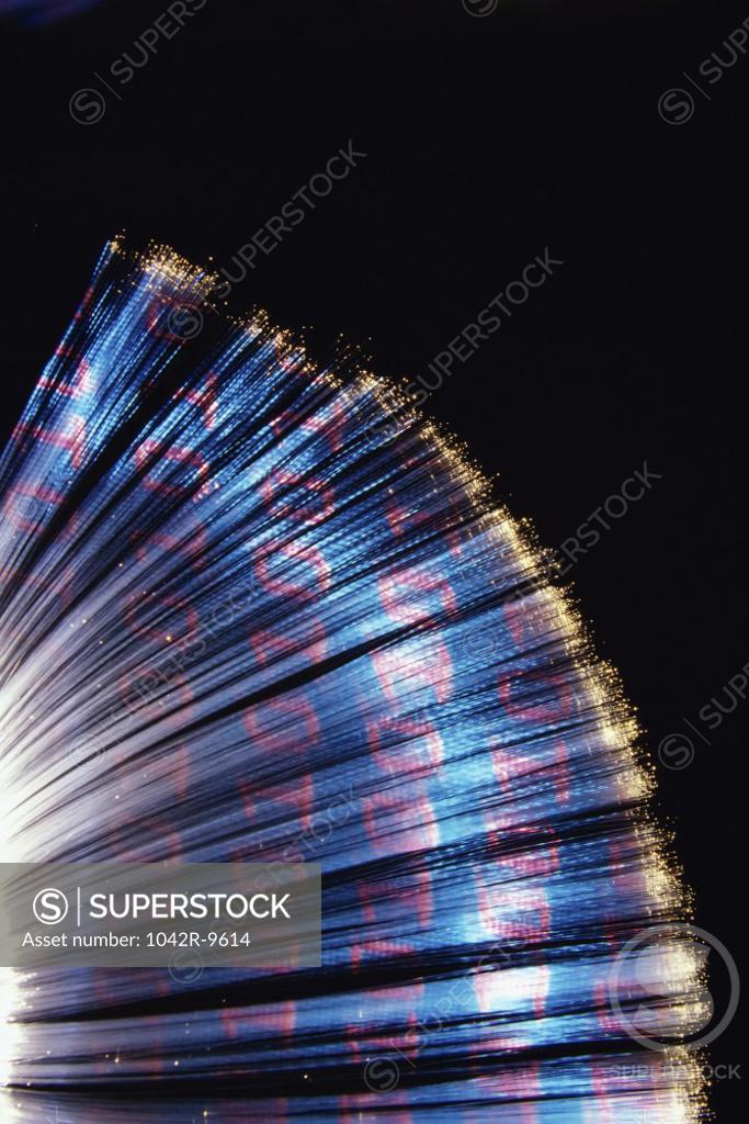 Stock Photo: 1042R-9614 Close-up of binary code on optic fibers