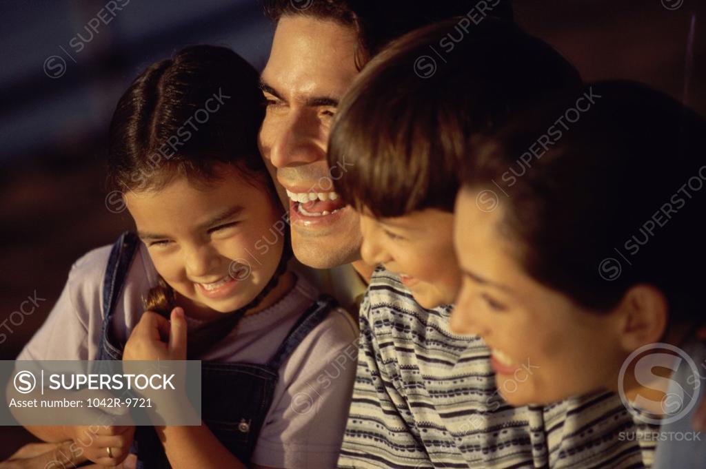 Stock Photo: 1042R-9721 Close-up of parents with their children