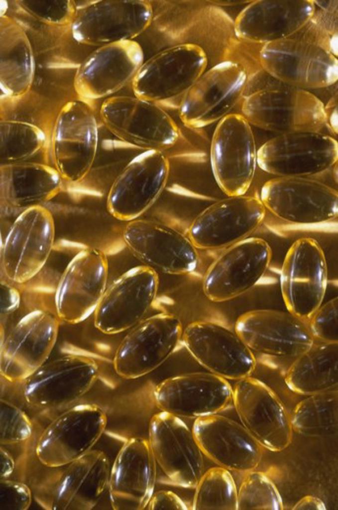 Close-up of vitamin capsules