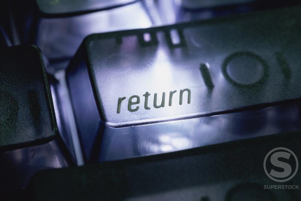 Close-up of the return key on a computer keyboard