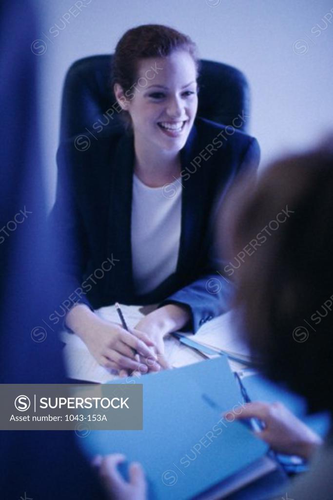 Stock Photo: 1043-153A Two businesswomen in a meeting