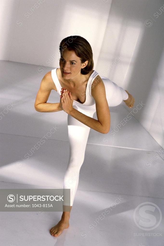 Stock Photo: 1043-815A Young woman exercising