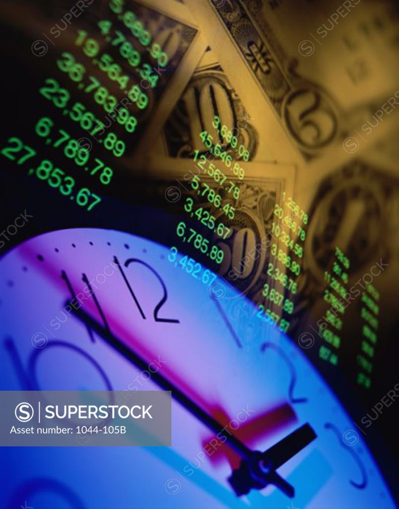 Stock Photo: 1044-105B Close-up of a clock on currency notes