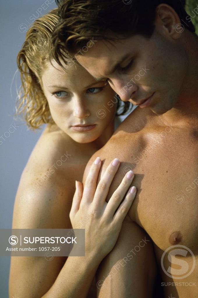 Stock Photo: 1057-205 Young couple hugging each other