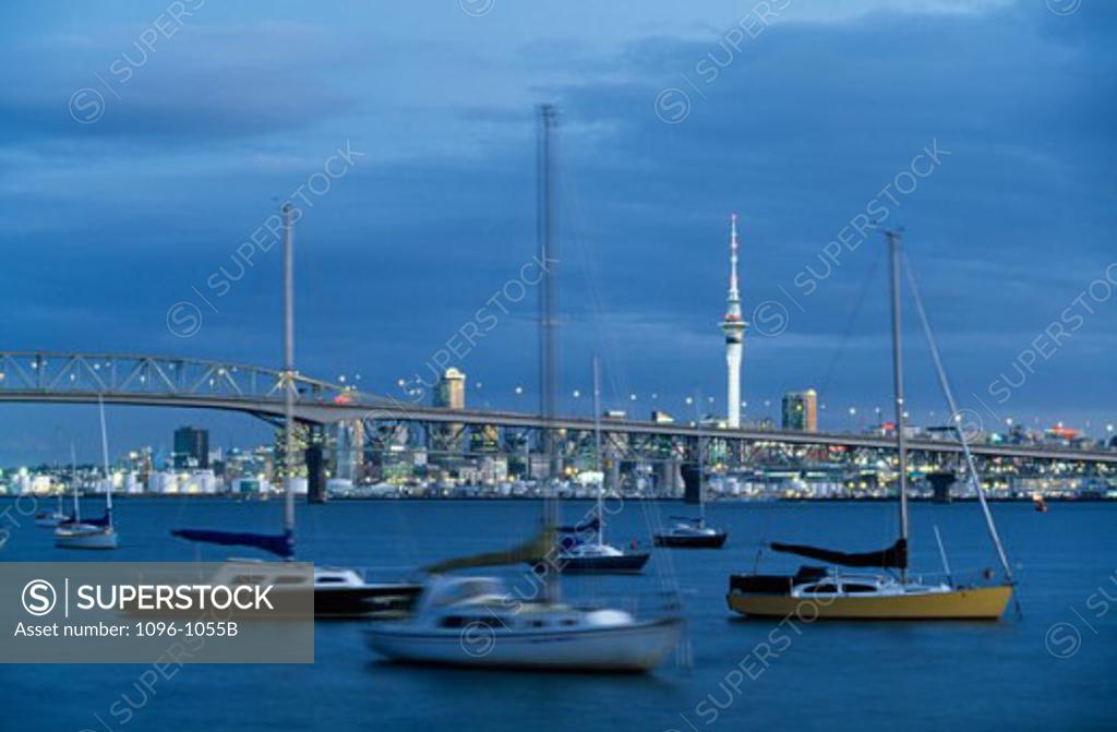 Stock Photo: 1096-1055B Sailboats in a harbor with a bridge in the background, Auckland Harbour Bridge, Auckland, New Zealand