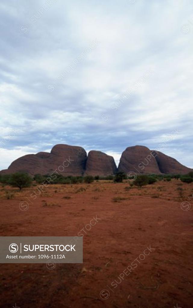 Stock Photo: 1096-1112A Rock formations on a landscape, Olgas, Uluru-Kata Tjuta National Park, Northern Territory, Australia
