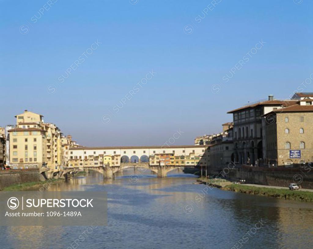 Stock Photo: 1096-1489A Bridge across a river, Ponte Vecchio, Florence, Italy