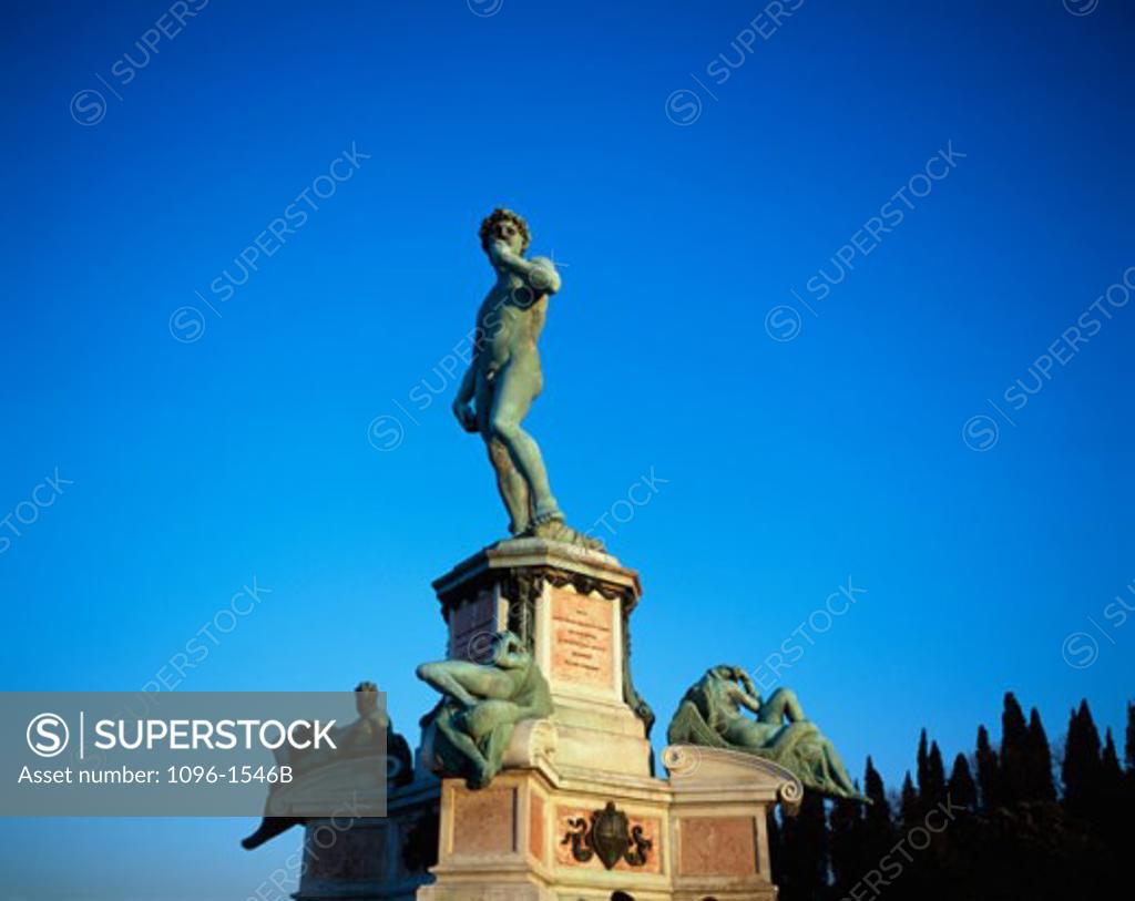 Stock Photo: 1096-1546B Low angle view of a statue, Statue of David, Piazza della Signoria, Florence, Italy