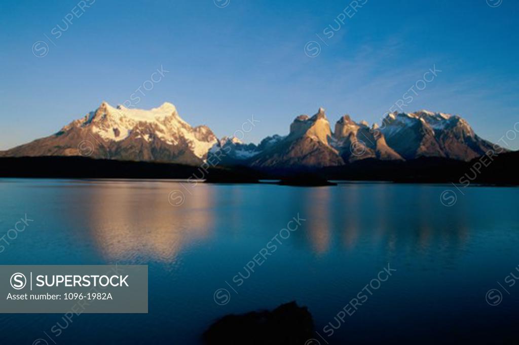 Stock Photo: 1096-1982A Snow covered mountain, Lake Pehoe, Torres del Paine National Park, Chile