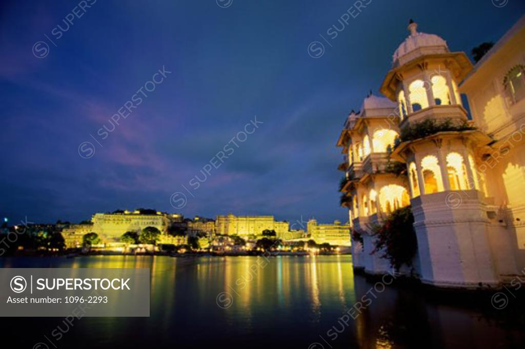 Stock Photo: 1096-2293 City Palace lit up at night, Udaipur, Rajasthan, India