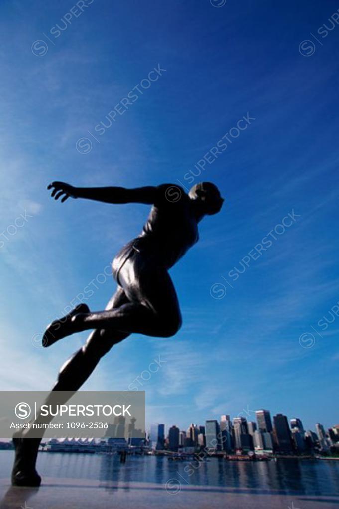 Stock Photo: 1096-2536 Low angle view of the Harry Jerome Statue, Stanley Park, Vancouver, British Columbia, Canada