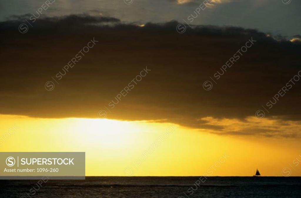 Stock Photo: 1096-260 Silhouette of a sailboat in the sea, Oahu, Hawaii, USA