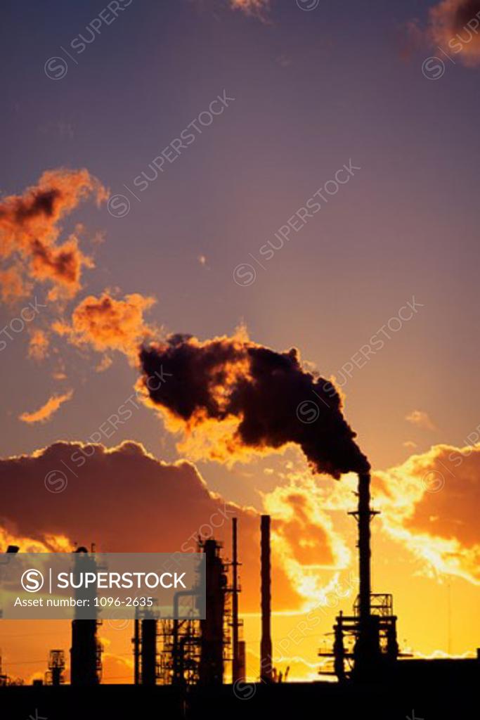 Stock Photo: 1096-2635 Smoke emitting from smoke stacks at a petroleum refinery, El Paso, Texas, USA
