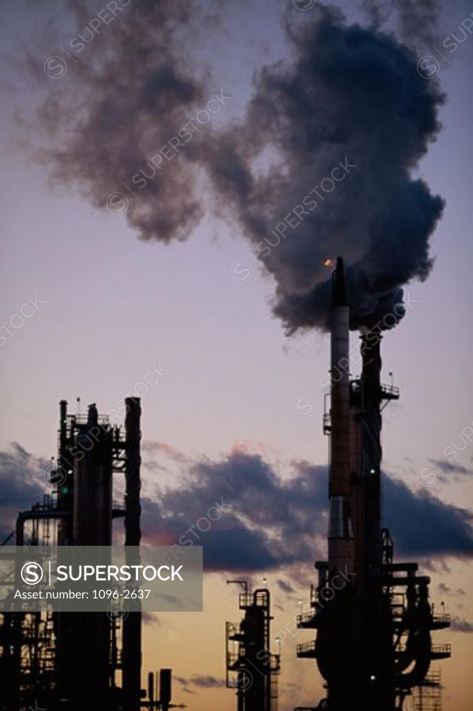 Stock Photo: 1096-2637 Smoke emitting from smoke stacks at a petroleum refinery, El Paso, Texas, USA