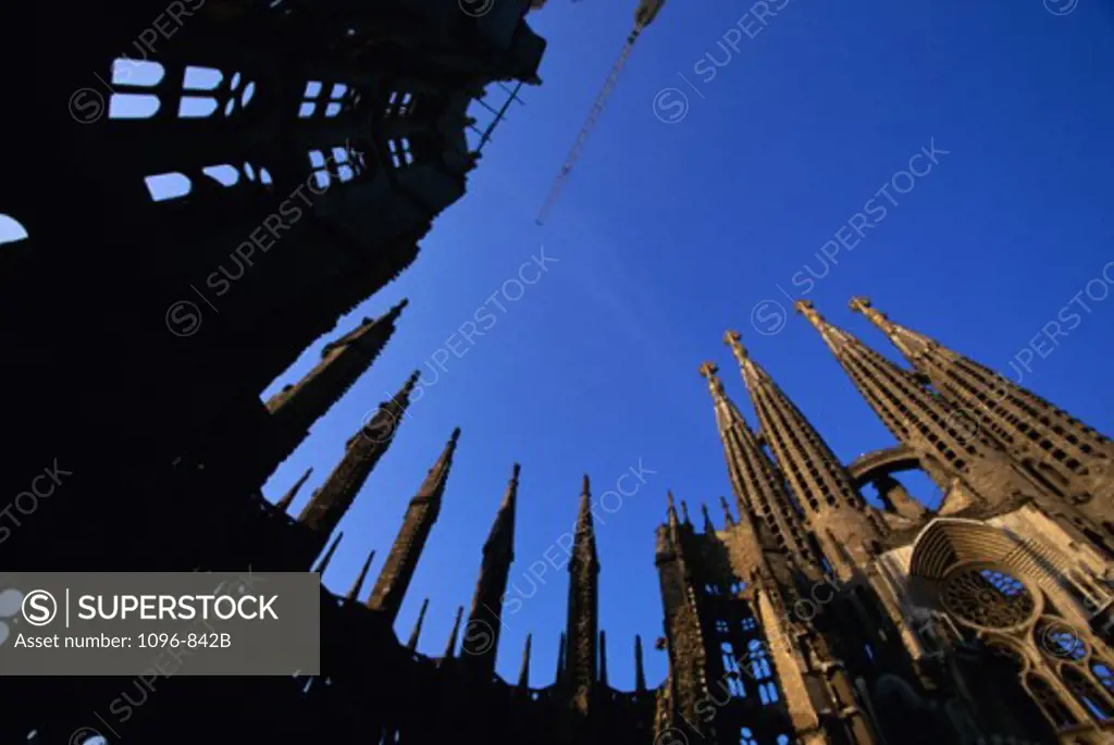 Low angle view of Sagrada Familia, Barcelona, Spain