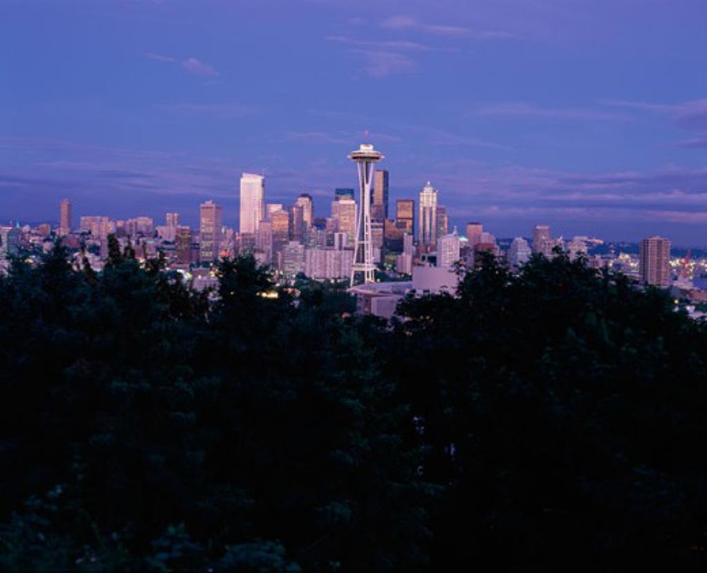 Skyline and Space Needle illuminated at dusk, Seattle, Washington, USA
