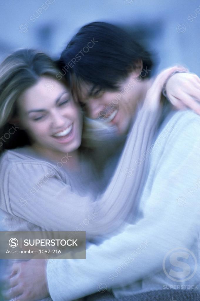 Stock Photo: 1097-216 Close-up of a young couple hugging each other