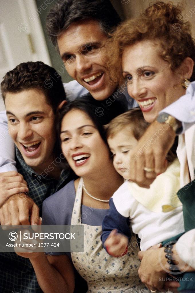 Stock Photo: 1097-424 Family standing together smiling