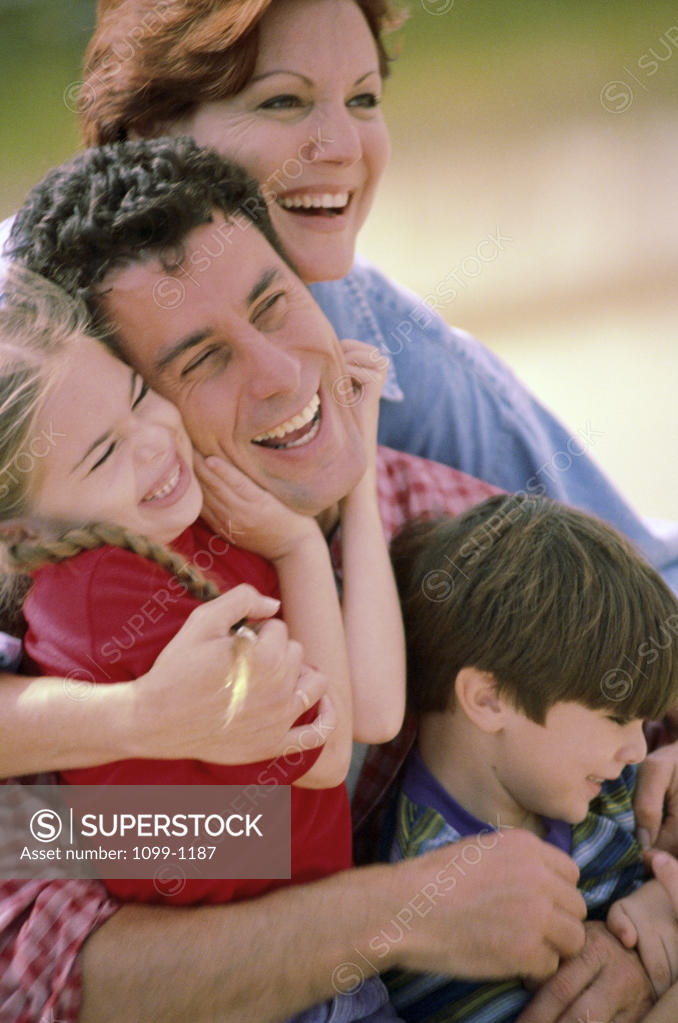 Stock Photo: 1099-1187 Parents with their son and daughter