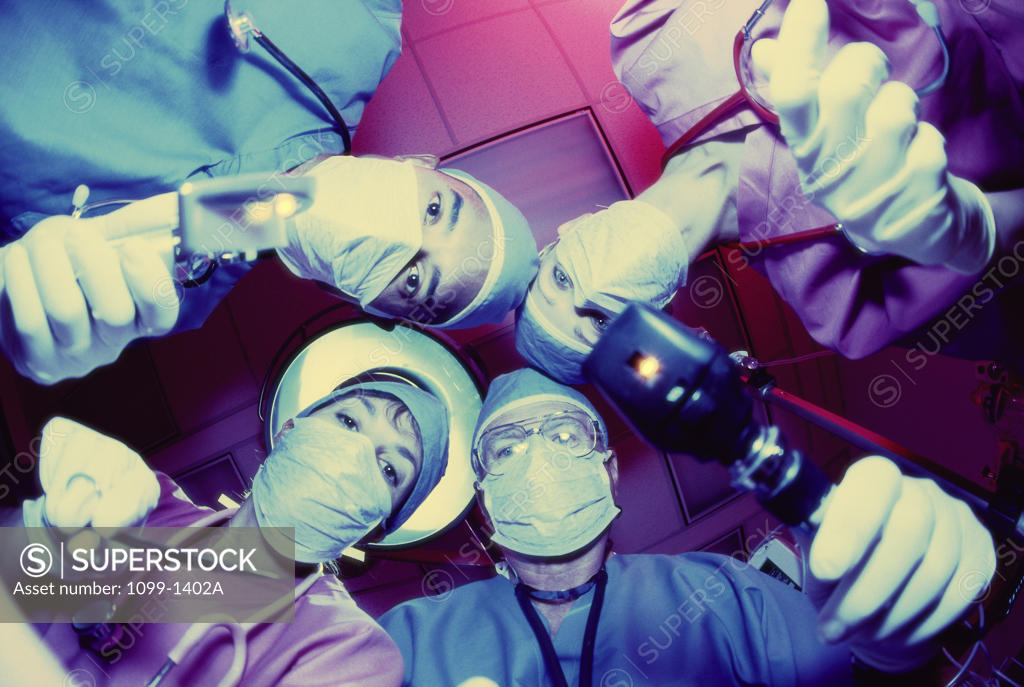 Stock Photo: 1099-1402A Low angle view of surgeons