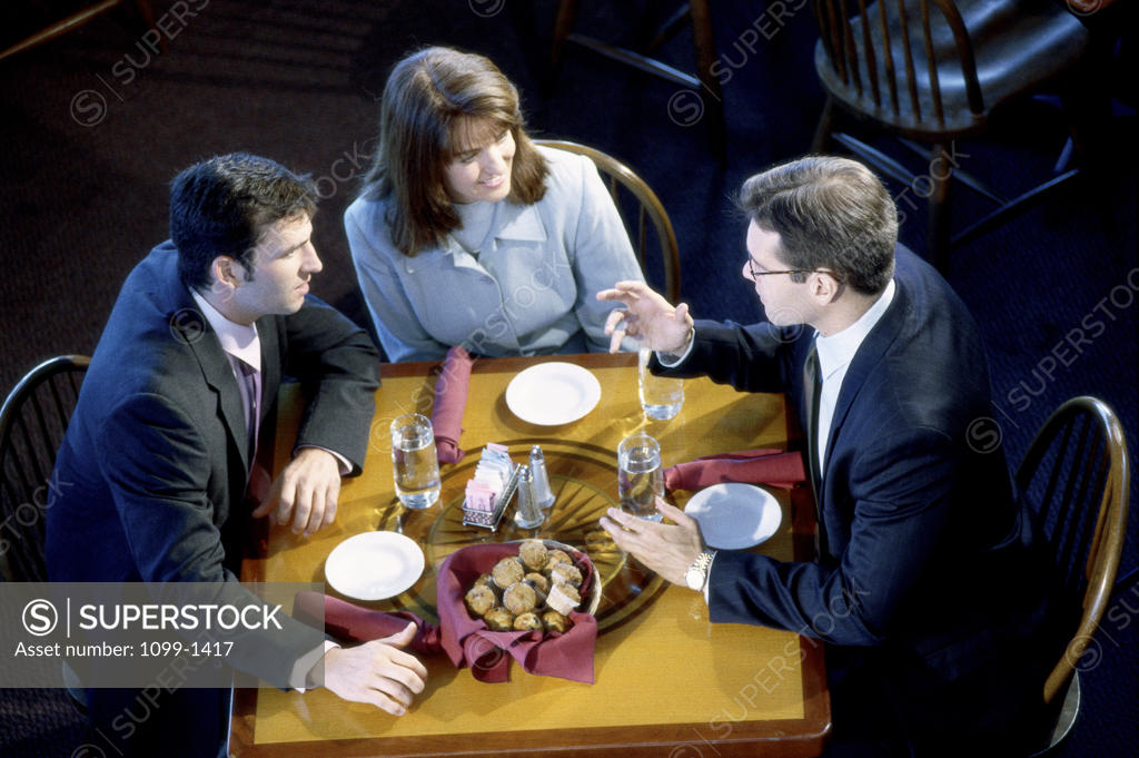 Stock Photo: 1099-1417 Business executives in a meeting