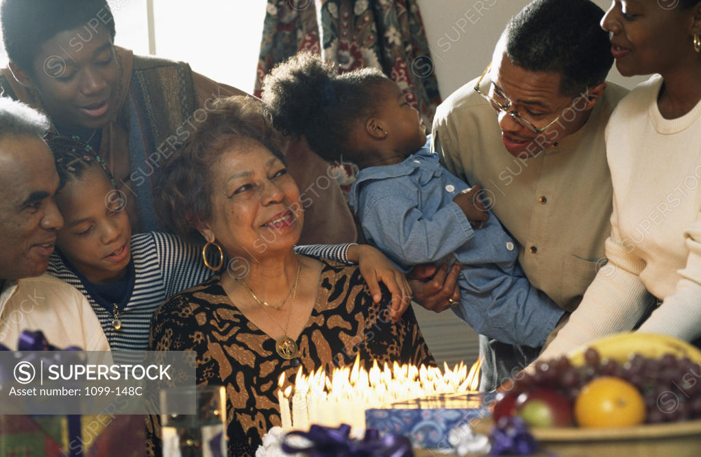 Stock Photo: 1099-148C Three generation family celebrating a birthday