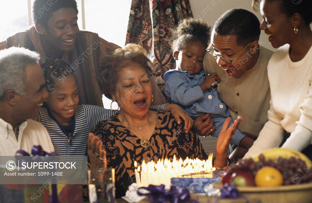 Stock Photo: 1099-148E Three generation family celebrating a birthday