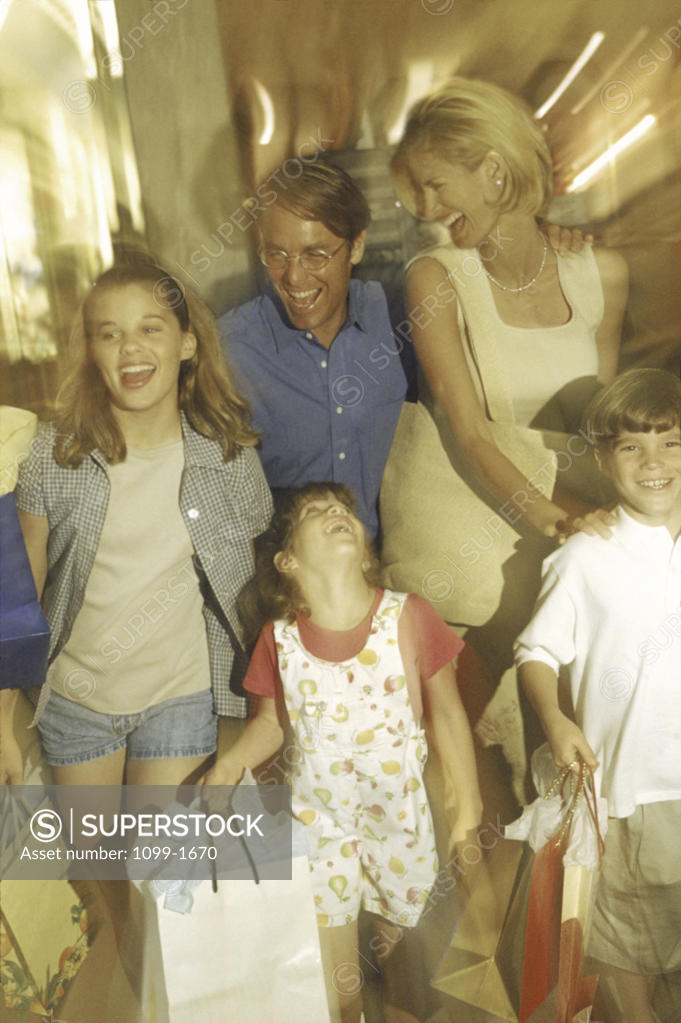 Stock Photo: 1099-1670 Parents with their son and two daughters
