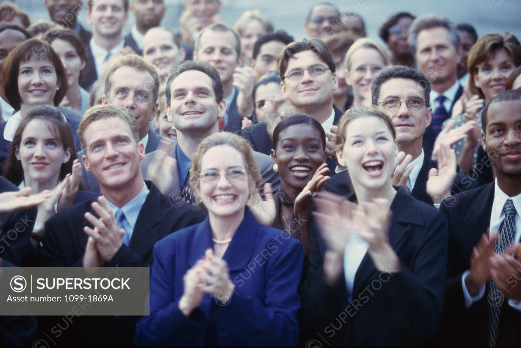 Stock Photo: 1099-1869A Crowd of business executives clapping