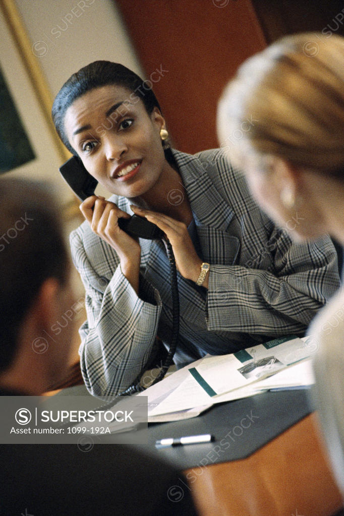 Stock Photo: 1099-192A Two businesswomen and a businessman in a meeting