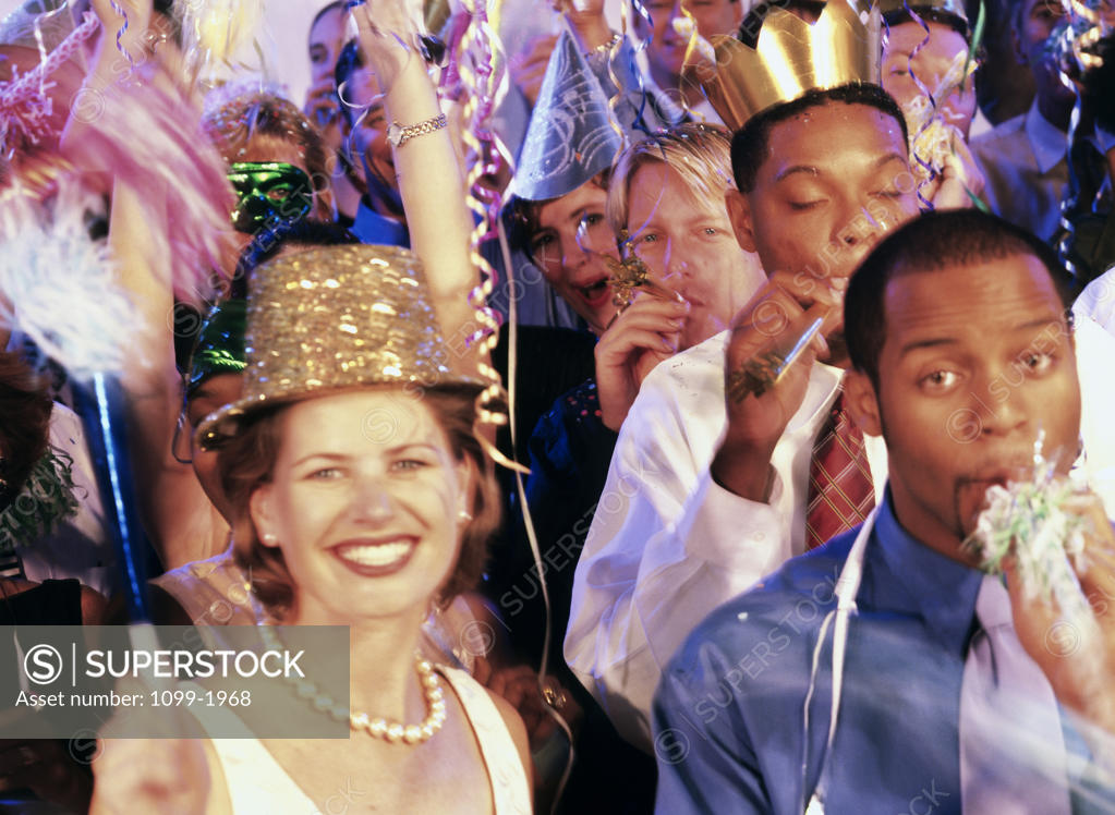 Stock Photo: 1099-1968 Group of people enjoying a New Year's party