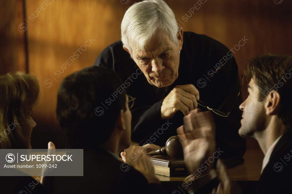 Stock Photo: 1099-242 Judge talking with lawyers