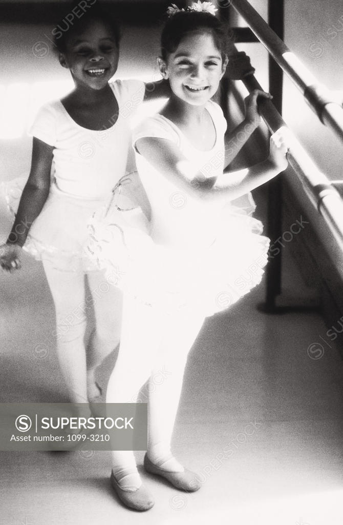 Stock Photo: 1099-3210 Portrait of two ballerinas smiling