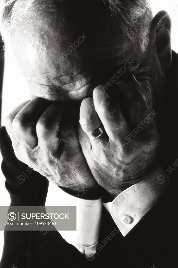 Stock Photo: 1099-3461 Businessman covering his face with his hands